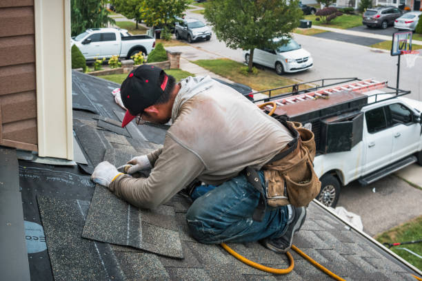 Professional Roofing technician working in Monticello, IL